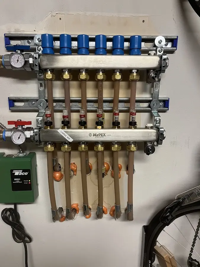 Plumber performing Water Heater Repair at a residential property in Kansas City